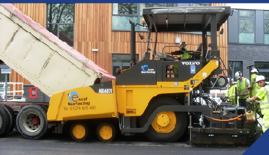 Excel Surfacing Macadam Surfacing and Planing - Our new Volvo 6870 paving machine